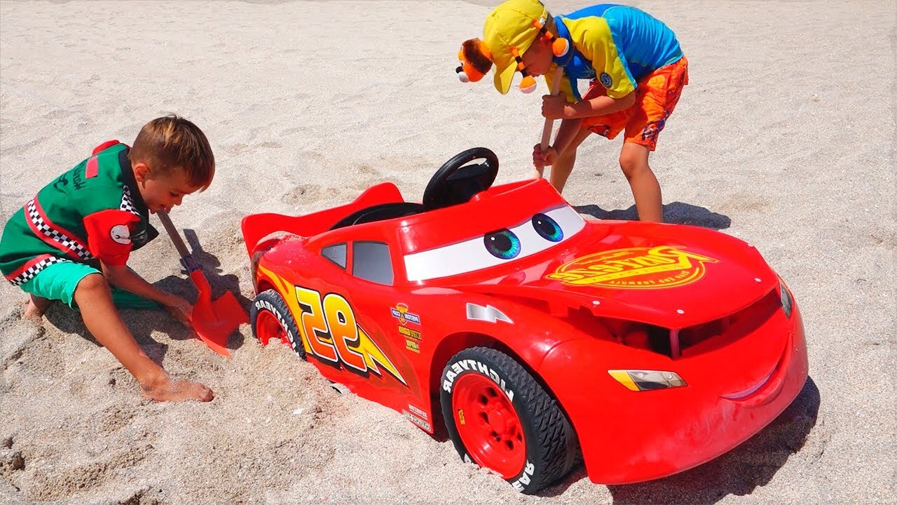 Nikita ride on car and stuck in the sand