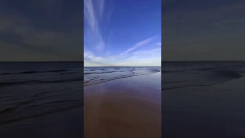 Water overtaking a sandbar