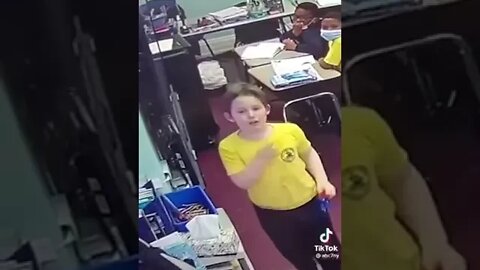 Water bottle explodes, causing kid to choke on cap. Teacher saves the day