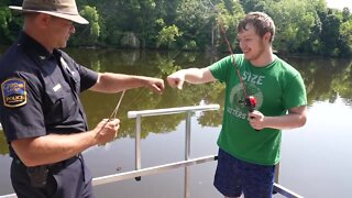 Grand Ledge Police Department hosts "Fish with a Cop"