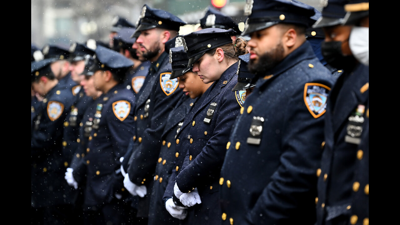 Thousands Gather to Mourn NYPD Officer