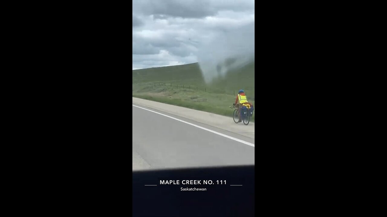 Riding bike on the highway in Saskatchewan