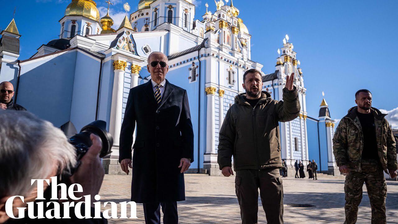 Biden and Zelenskiy walk in Kyiv as air raid sirens blare