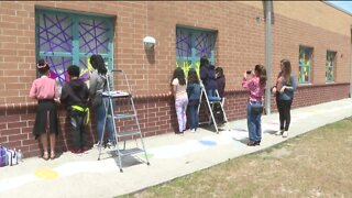 Tampa elementary students work to beautify campus with stained glass art project