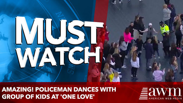 Amazing! Policeman dances with group of kids at 'One Love'