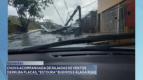 Guanhães: Chuva acompanhada de rajadas de ventos derruba placas, estoura bueiros e alaga ruas.