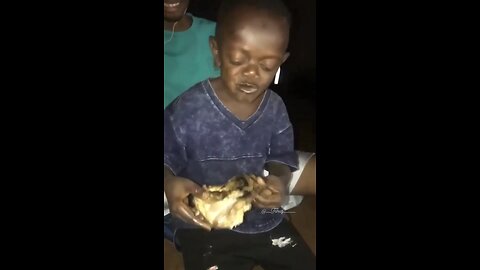 Viral black kid eating chicken