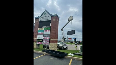 Springville Shopping Center new message center going up today.