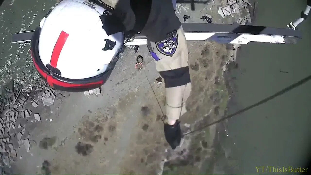 A drowning swimmer is rescued by being hoisted to a waiting ambulance at Point Pinole