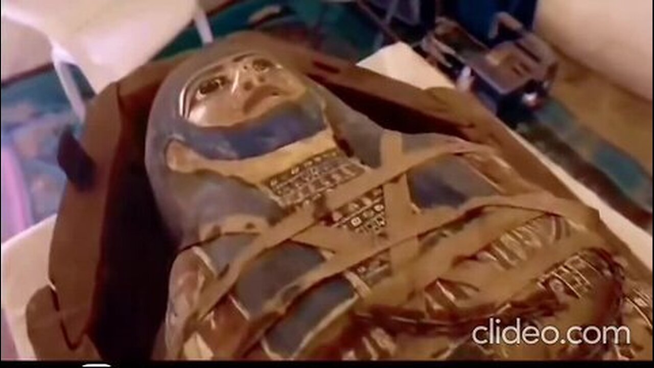 The moment of unveiling a beautifully wrapped mummy