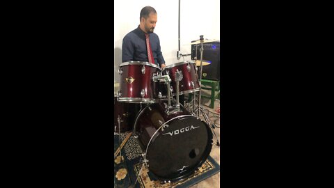 Playing drums in church