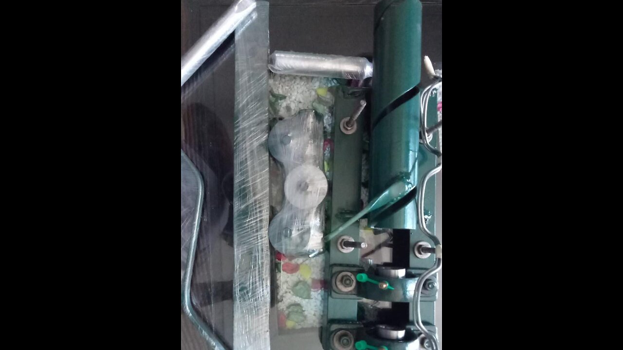 Home made chain link fence machine.