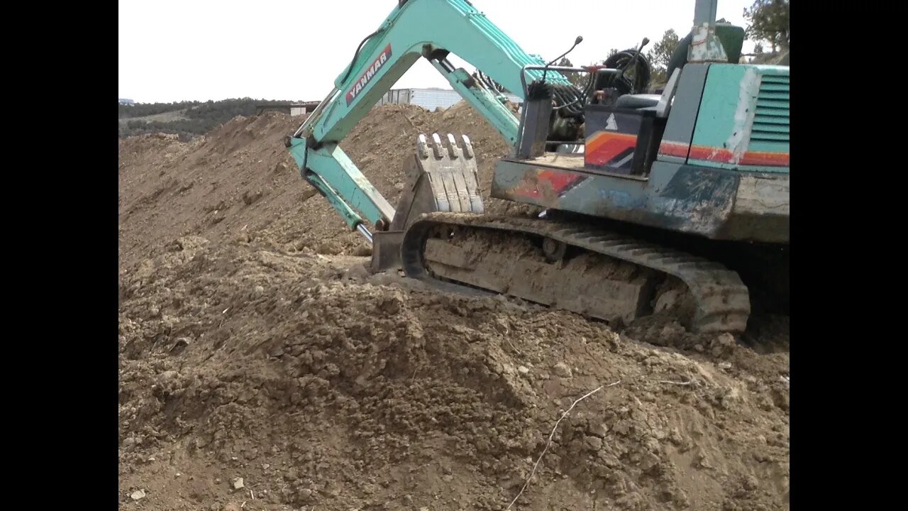 Yanmar YB 451 Excavator Working The High Bank