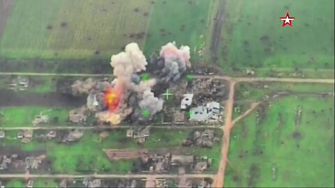 A barrage of artillery / rockets hit Ukrainian forces positions in rural buildings