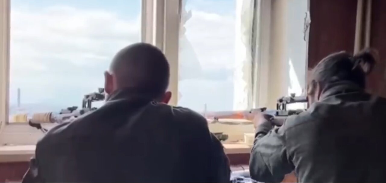A pair of DPR volunteer snipers, against Ukrainian nationalists in the Azovstal region.