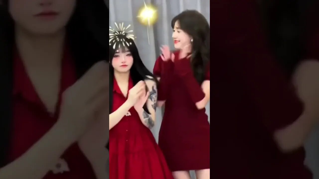 Two Chinese Girls Doll It Up For The Camera