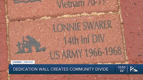A memorial meant to bring people together is creating a divide in the community