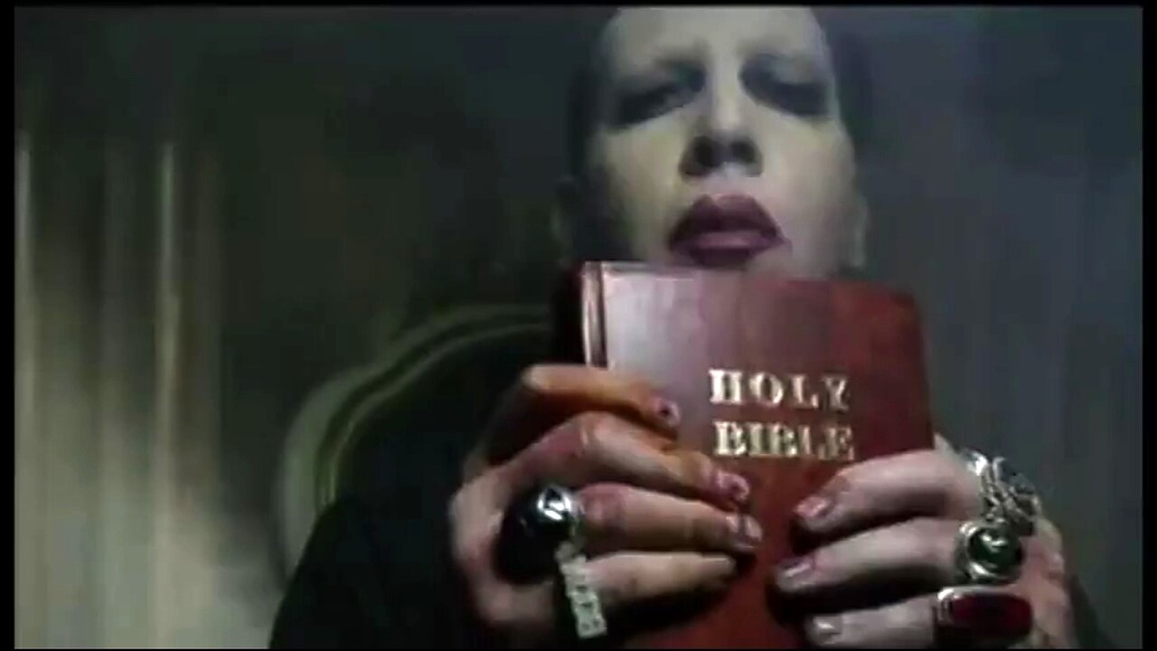 RAISE SATAN'S RED FLAG FOR BLOOD & COMMUNISM! MARILYN MANSON RETURNS TO DECLARE WAR ON CHRISTIANS!