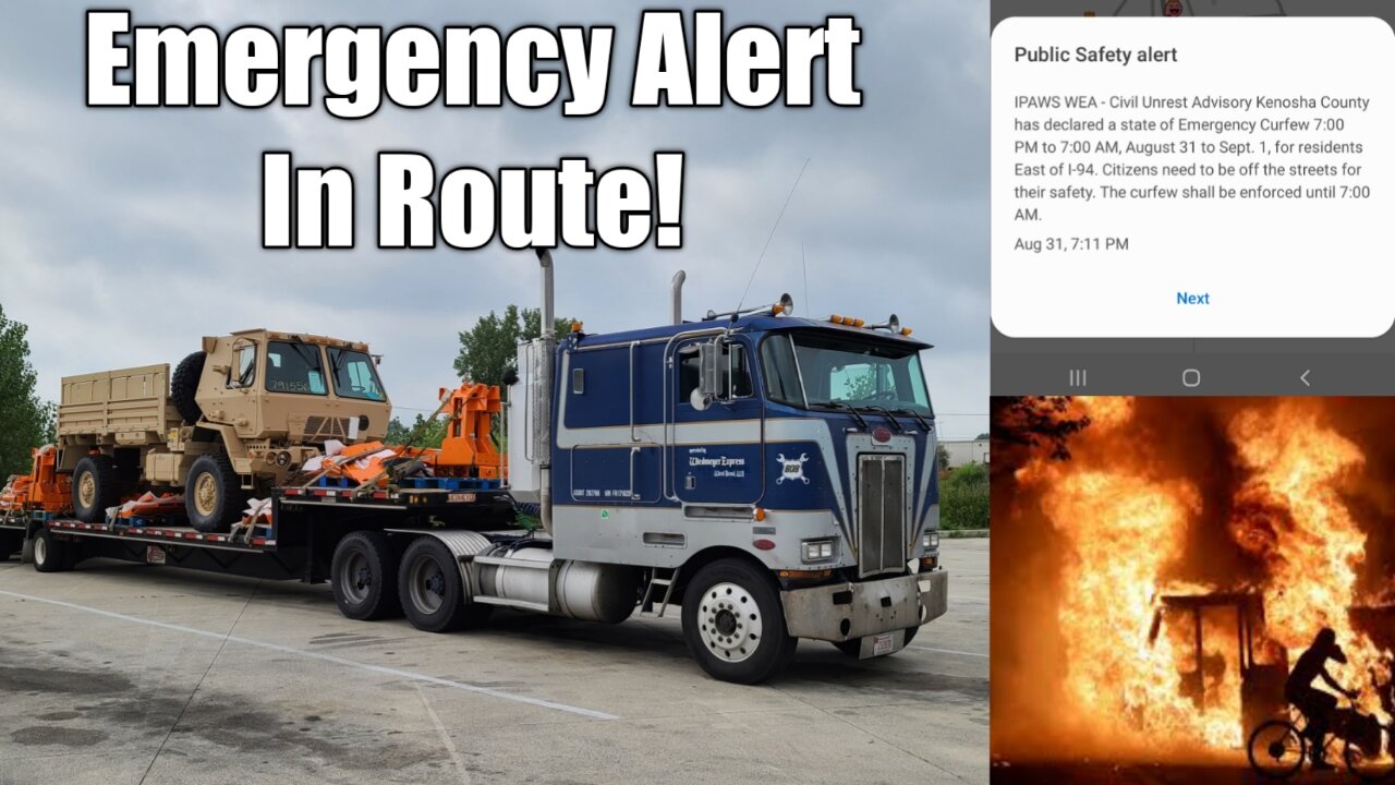 Cabover Peterbilt Hauls National Guard Truck Past Kenosha 009