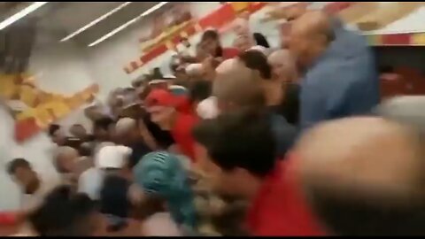 Chaos in supermarket Tunisia to collect sugar. Country has been plagued by major shortages
