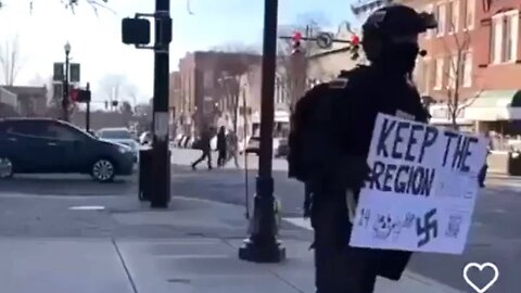 Guy Dressed As Russian Soldier In Indiana Holding Sign Saying 'Keep The Area White' Gets Confronted