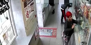 Woman makes torch, burns store items