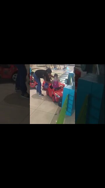 Young grandmother atends to her baby girls grandkids- fun in the small cars #babygirl