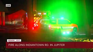 Fire spreads from vans to furniture store in Jupiter