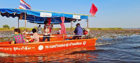 Lotus lake udonthani Thailand out on the boat 500 baht
