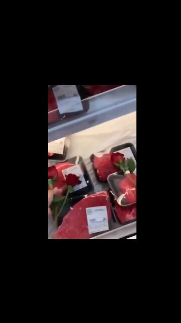Vegans laying floral tributes at the meat counter