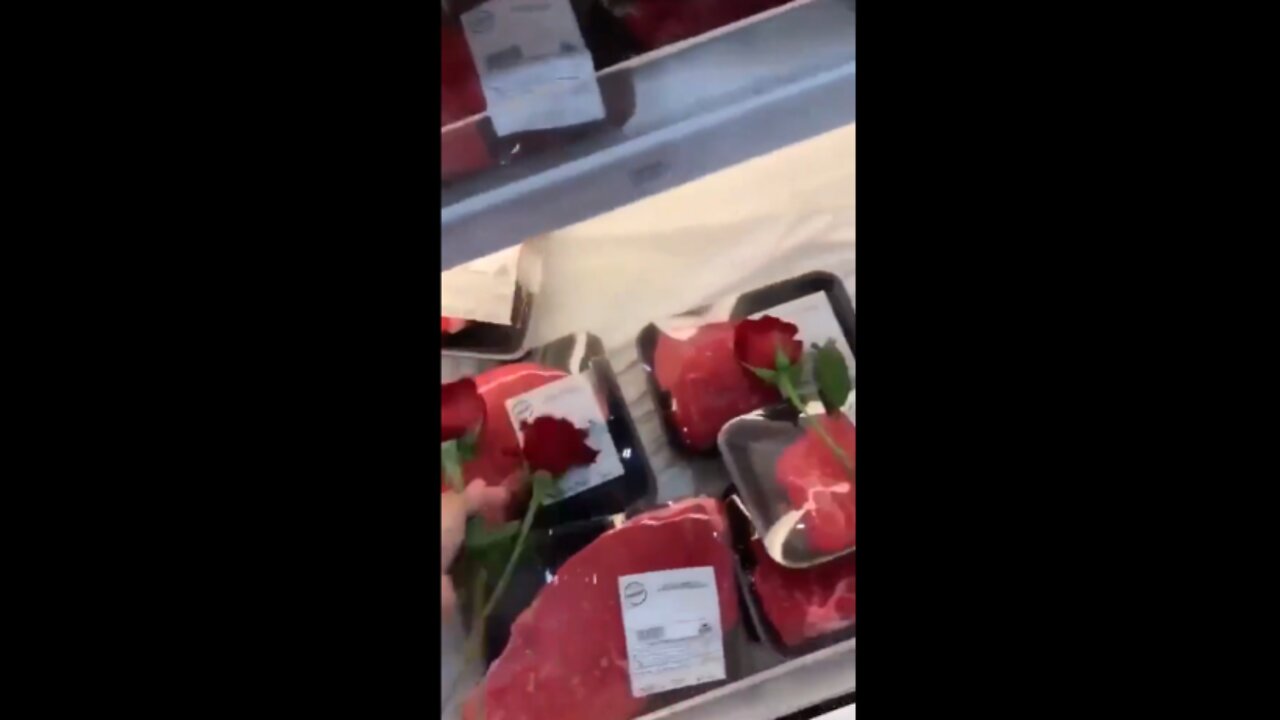 Vegans laying floral tributes at the meat counter
