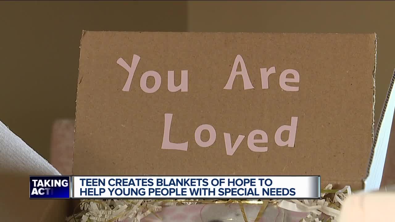 14-year-old Emily McCulloch uses blankets to lift up kids with special needs