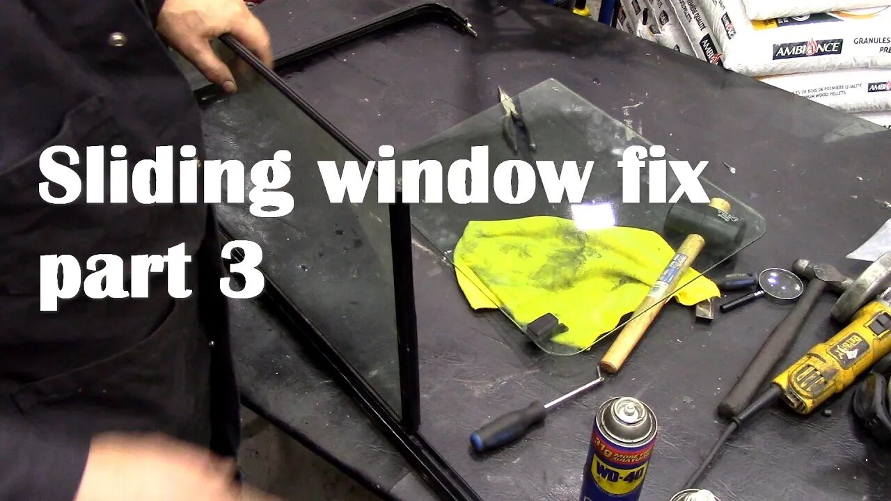 From October re sealing a sliding side window. PART 3 Juggling cats!
