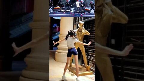 Skinny Chinese Girl Dances With Johnny Walker Gold