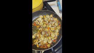Sausage with onions and peppers and melted cheese sliders