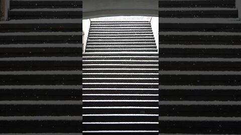 Snow leaden stairs to....