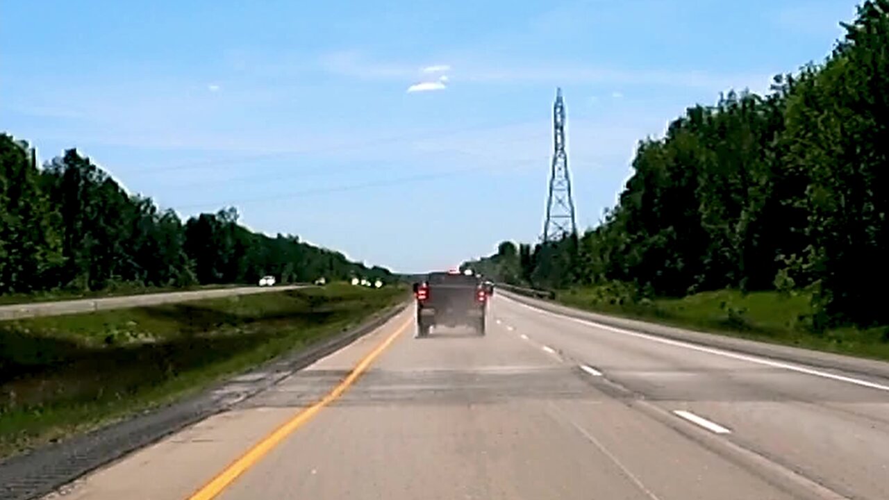Skillful truck driver maintains control during high speed tire blowout