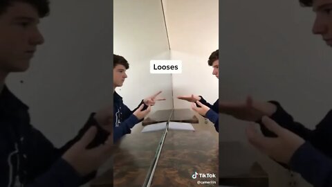 losing rock paper scissors in the mirror TikTok @