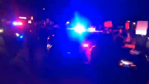 Deputy Warns Protester in Cruiser's Way, Takes Her Down, Keeps Right on Rolling