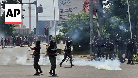 Police fire gunshots, tear gas as thousands protest the crisis in Nigeria| RN