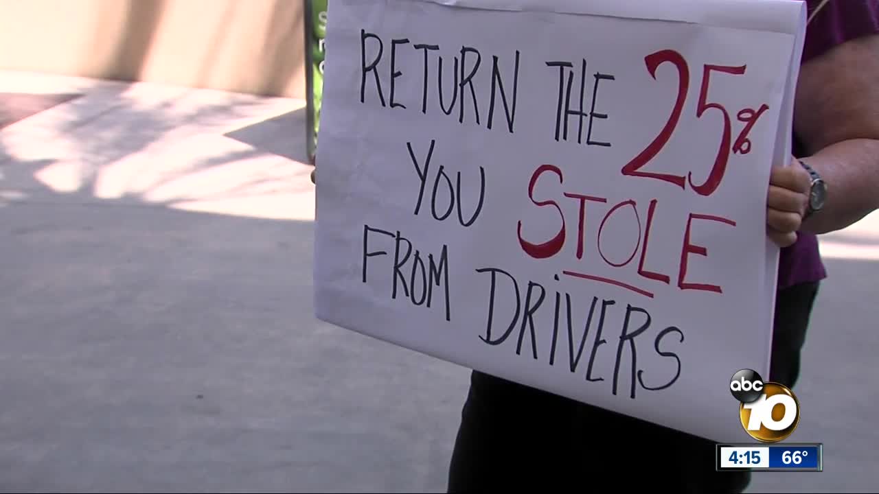 Drivers upset after ridesharing companies cut pay