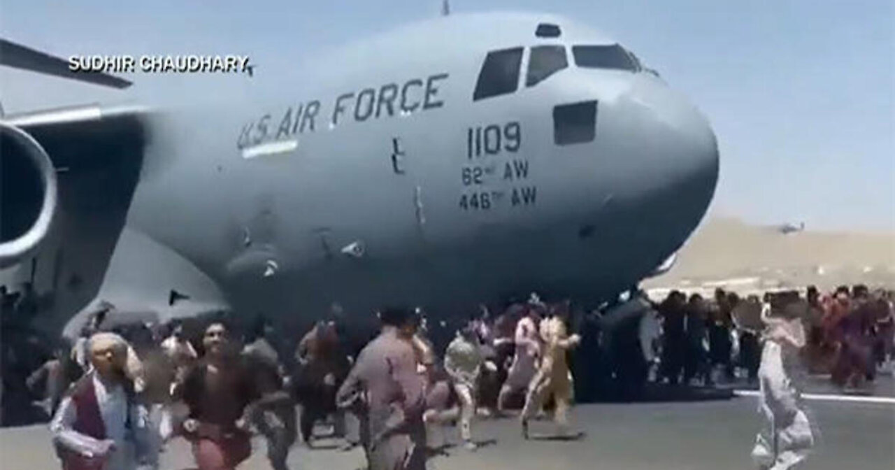 Afghans flee Kabul Airport clinging to U.S. planes to after Taliban took control of Country