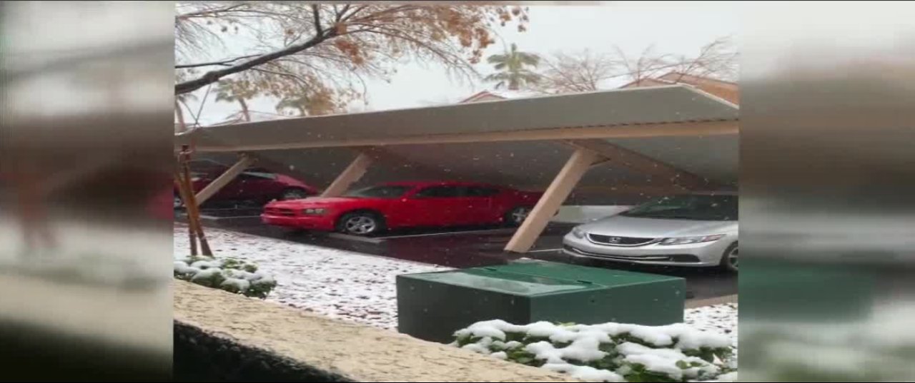 Carport collapses, traps multiple cars