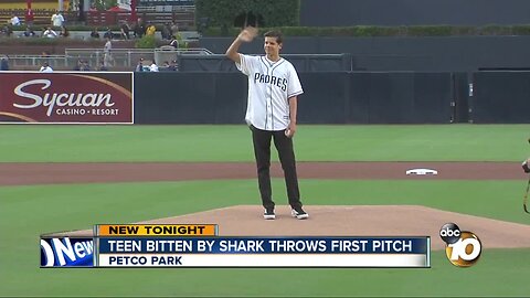 Teen bitten by shark throws first pitch at Padres game