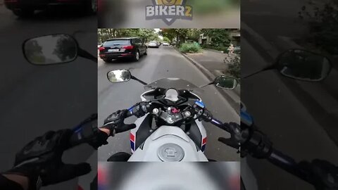 biker gets punched in the face...