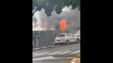 A house in Ma'alot caught fire after being hit by a rocket - no injuries.