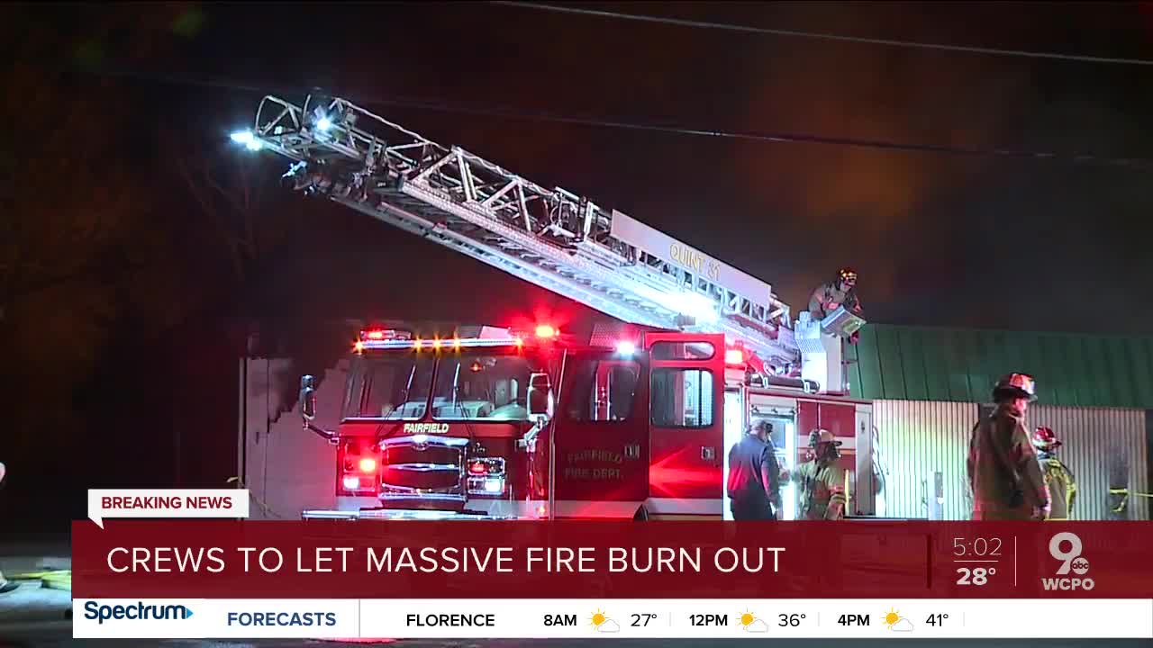 Crews to let massive fire burn out