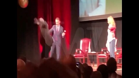 Chevy Chase Falls Off Stage After Arriving In Wheelchair