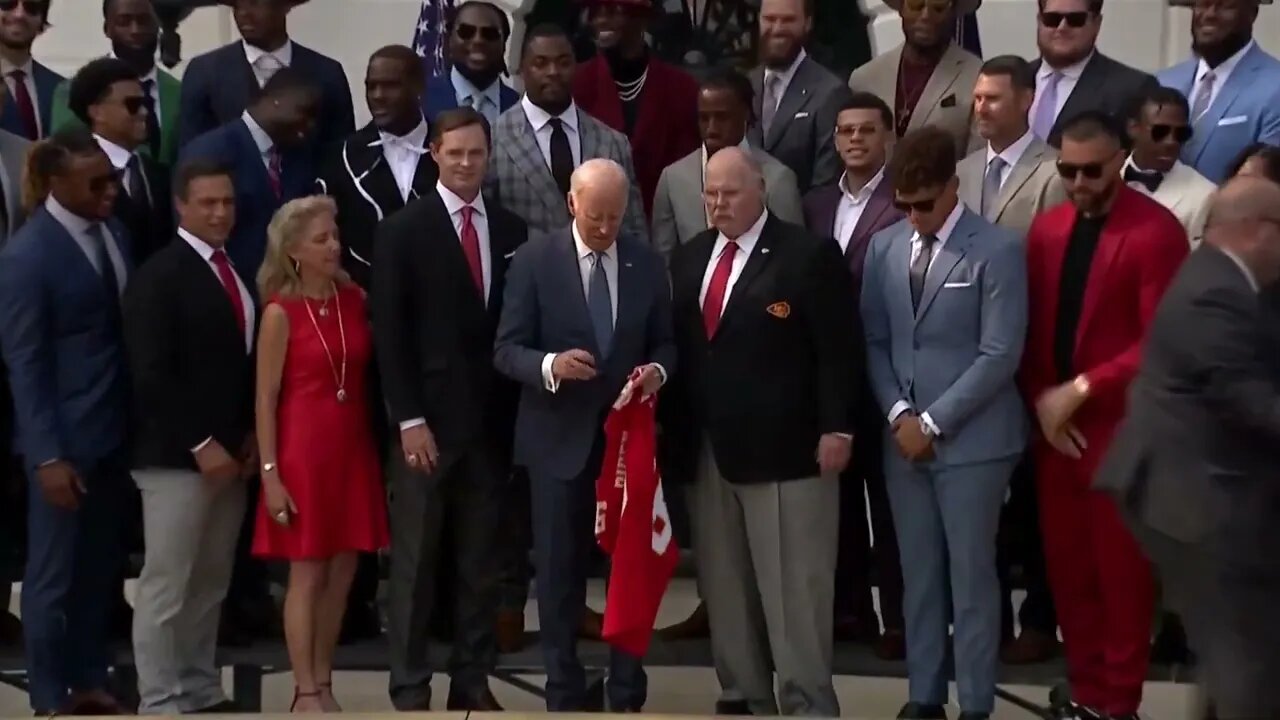 Biden Gets Handed Kansas City Chiefs Jersey, Immediately Asks, "What Am I Doing?"