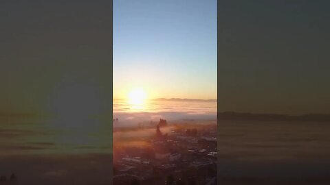 Drone Views of Sunset And Water With Clouds